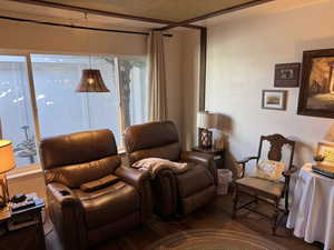 Living area featuring engineered hard wood.  This room is currently being used as a TV room, but it would be a bedroom, or office, or craft room, etc