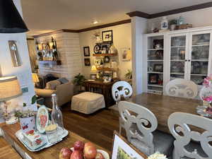 Dining room featuring crown molding and engineered hard wood