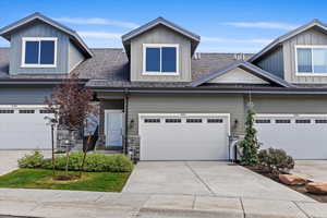 Craftsman house featuring a garage