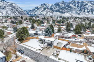 Snowy aerial view with a mountain view