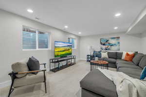 Living room with light carpet