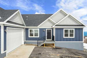 View of front of house with a garage