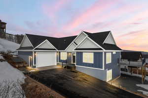 View of front of home with a garage