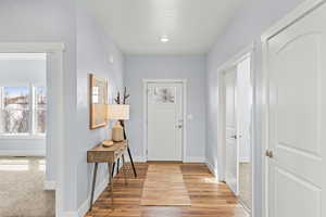 Foyer featuring light hardwood / wood-style floors