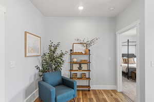 Living area with light wood-type flooring