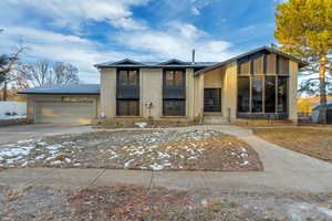 View of front facade with a garage