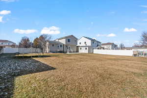 View of yard featuring a storage unit