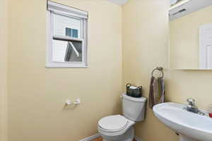 Bathroom with sink and toilet