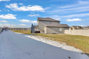 View of property exterior featuring a yard