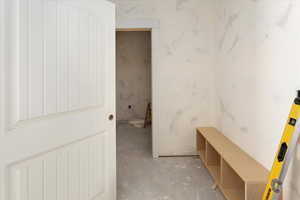 Bathroom featuring concrete flooring