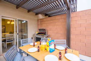 View of patio with a pergola