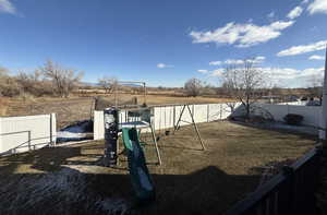 View of yard with a playground