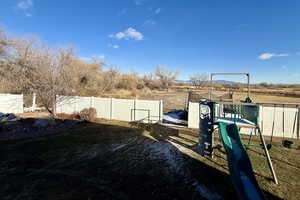 View of yard with a playground