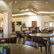 Dining room featuring a towering ceiling