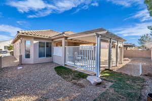 View of side of home featuring a pergola