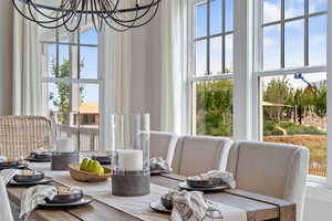 Dining area with a chandelier