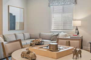 Living room with wood-type flooring