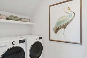 Laundry room featuring washing machine and dryer