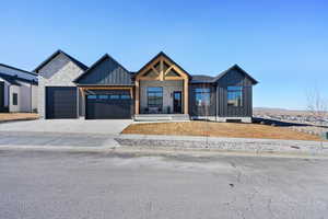 View of front of property with a garage