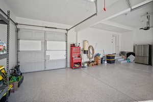 Garage with stainless steel fridge