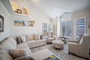 Living room with vaulted ceiling