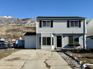 View of front of house featuring a mountain view