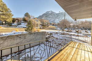 Back of property featuring a mountain view