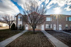 View of property featuring a front yard