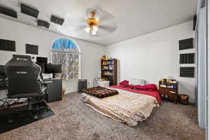 Primary bedroom featuring ceiling fan.