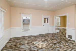 Family room with dark hardwood / wood-style floors