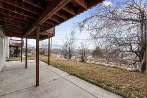 View of patio featuring a mountain view