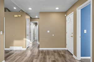 Entryway featuring hardwood / wood-style floors