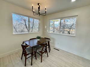 Dining room with a chandelier