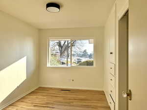 Bedroom 3 with light hardwood / wood-style floors