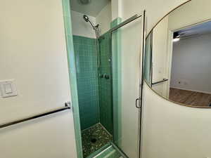 Master Bathroom with eclectic green tile