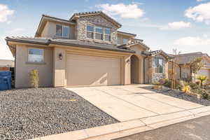 View of front facade with a garage