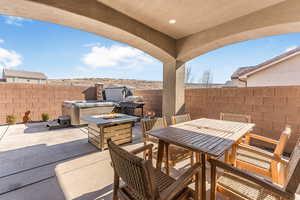 View of patio / terrace featuring a fire pit