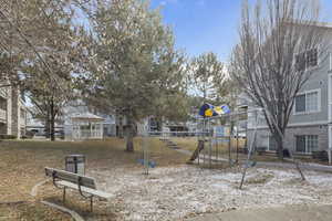 View of home's community featuring a playground