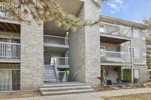 View of property featuring central AC unit