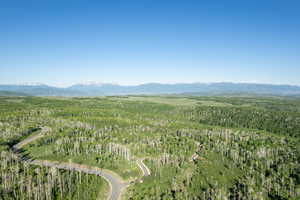 Aerial overview of property's location featuring mountains