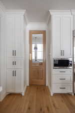 Interior space featuring light hardwood / wood-style floors and sink