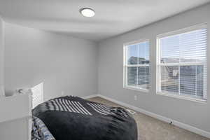View of carpeted bedroom