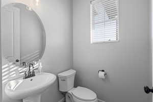Bathroom with toilet and sink