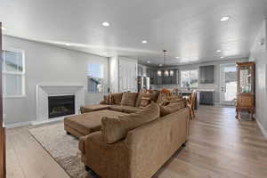 Living room featuring light hardwood / wood-style flooring and sink