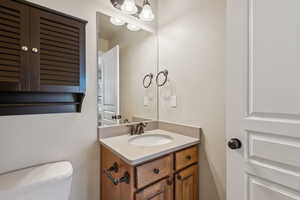 Bathroom with toilet and vanity