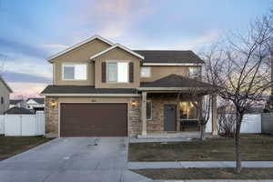 View of front of home with a garage