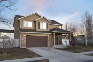 View of front of house with a garage