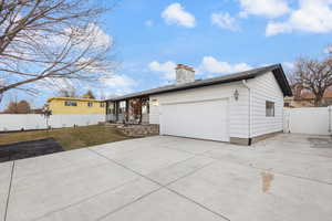 Ranch-style house featuring a garage