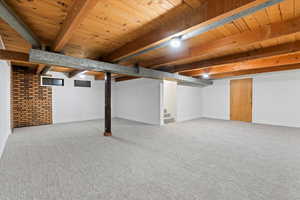 Basement with carpet