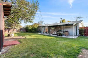 View of yard with a patio
